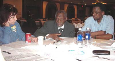 Monsieur Abdoul Ghoudouss Kamara lors du dernier congrès des flam en compagnie de Mireille Hamelin et Samba Thiam