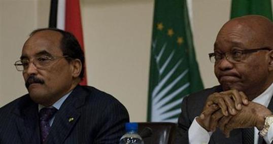 Les présidents Mohamed Ould Abdel Aziz (Mauritanie, à gauche) et Jacob Zuma (Afrique du Sud), deux des médiateurs de l’Union africaine réunis hier à Pretoria. Les présidents Mohamed Ould Abdel Aziz (Mauritanie, à gauche) et Jacob Zuma (Afrique du Sud), deux des médiateurs de l’Union africaine réunis hier à Pretoria.