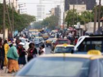 Une rue animée de Dakar, la capitale sénégalaise. Une rue animée de Dakar, la capitale sénégalaise.