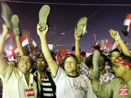 Des opposants au président Morsi, le 3 juillet place Tahrir au Caire. Des opposants au président Morsi, le 3 juillet place Tahrir au Caire.