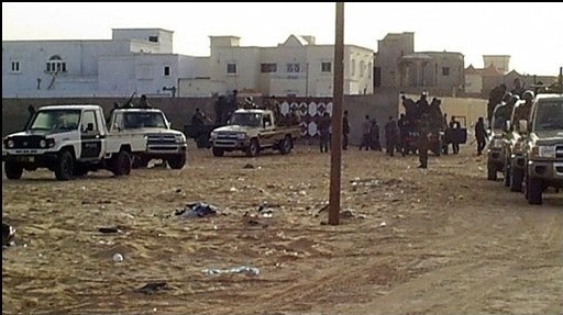 Les forces de sécurité mauritaniennes se préparent à intervenir dans un bâtiment où sont retranchés des islamistes, le 8 avril 2008 au nord de Nouakchott Les forces de sécurité mauritaniennes se préparent à intervenir dans un bâtiment où sont retranchés des islamistes, le 8 avril 2008 au nord de Nouakchott